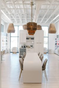 - Art of Life Salon & Spa at Urbandale and Waukee, IA Modern, minimalist salon in Waukee and Urbandale with sleek tables, chic seating, bright windows—balayage, highlights, bridal hair. - Art of Life Salon & Spa at Urbandale and Waukee, IA