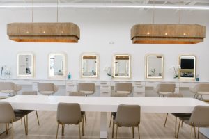 - Art of Life Salon & Spa at Urbandale and Waukee, IA Modern salon interior with beige chairs, mirrors, orchids; best salon in Waukee and Urbandale for balayage, highlights, bridal hair. - Art of Life Salon & Spa at Urbandale and Waukee, IA